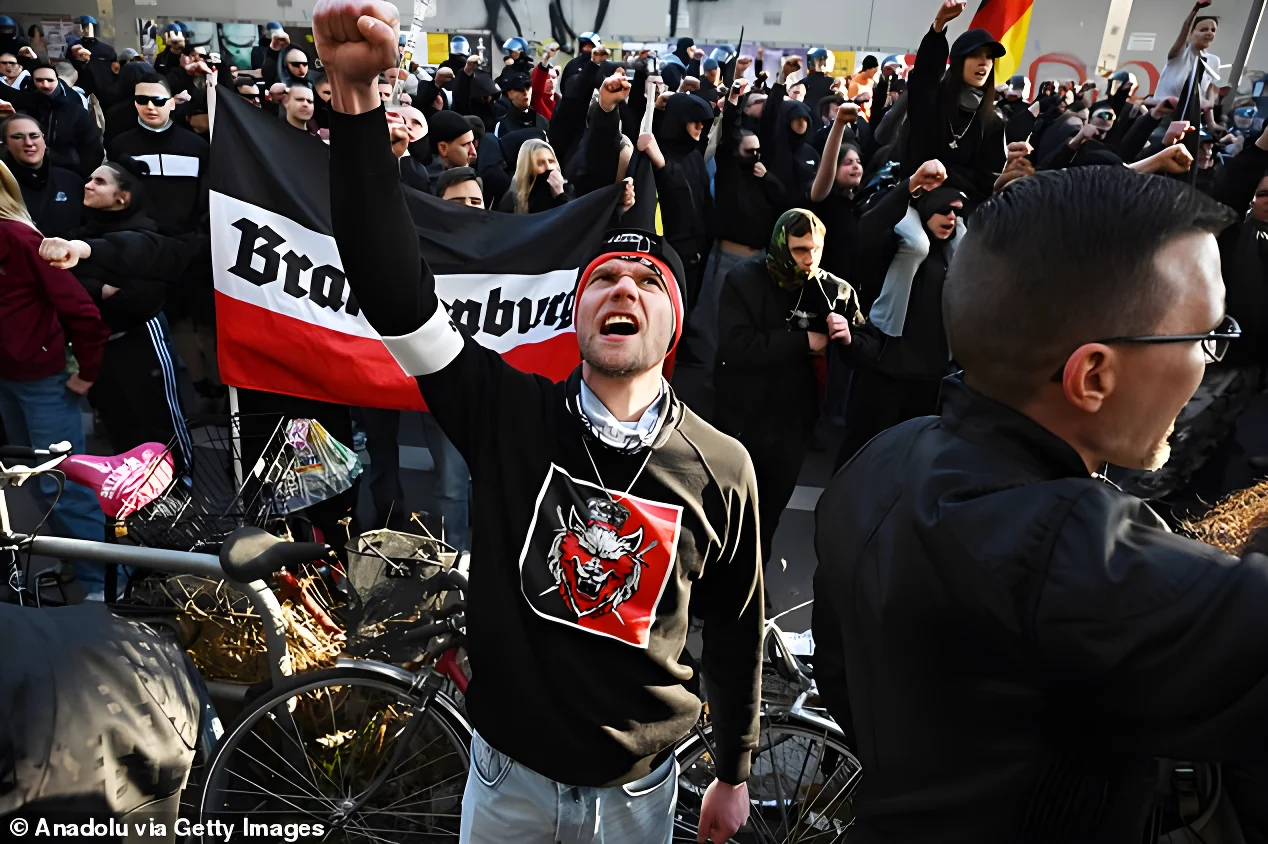 A far-right group of approximately 800 people hold a demonstration marching from the Ostkreuz Train Station towards Berlin