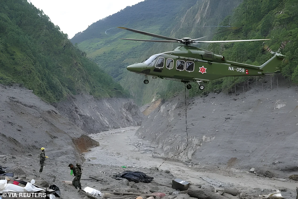 Nepal army soldiers are pictured during a search and rescue operation outside a tunnel near the Hydropower Project sites on Wednesday